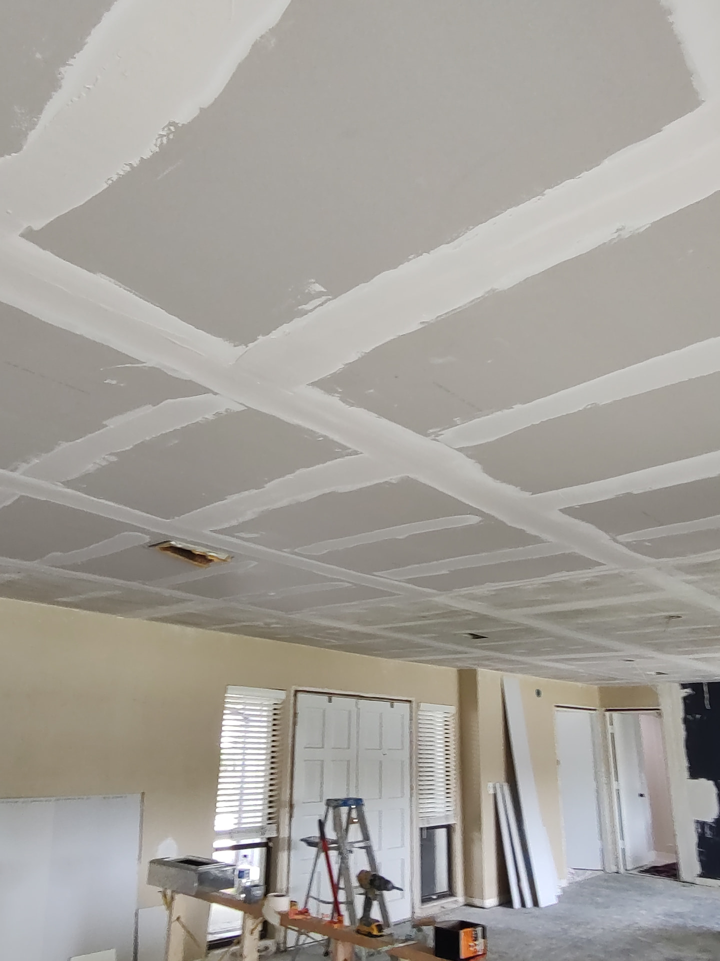 Ceiling drywall repair and texture work on a Tampa home