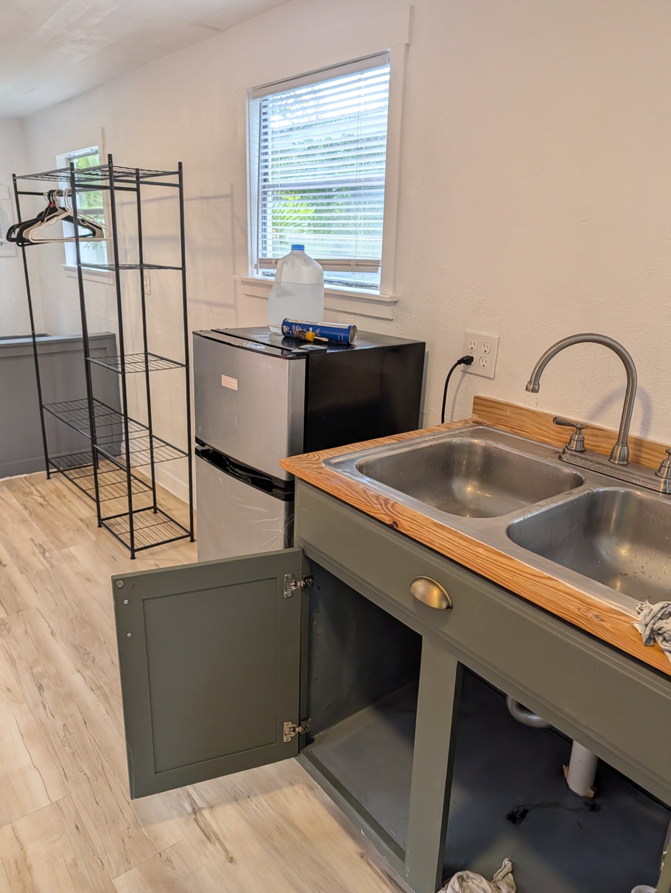 Tampa kitchenette with refinished shaker cabinets, wood butcher-block counter and new sink